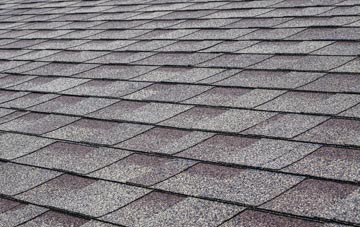 Pit tiles for shallow pitch roofing